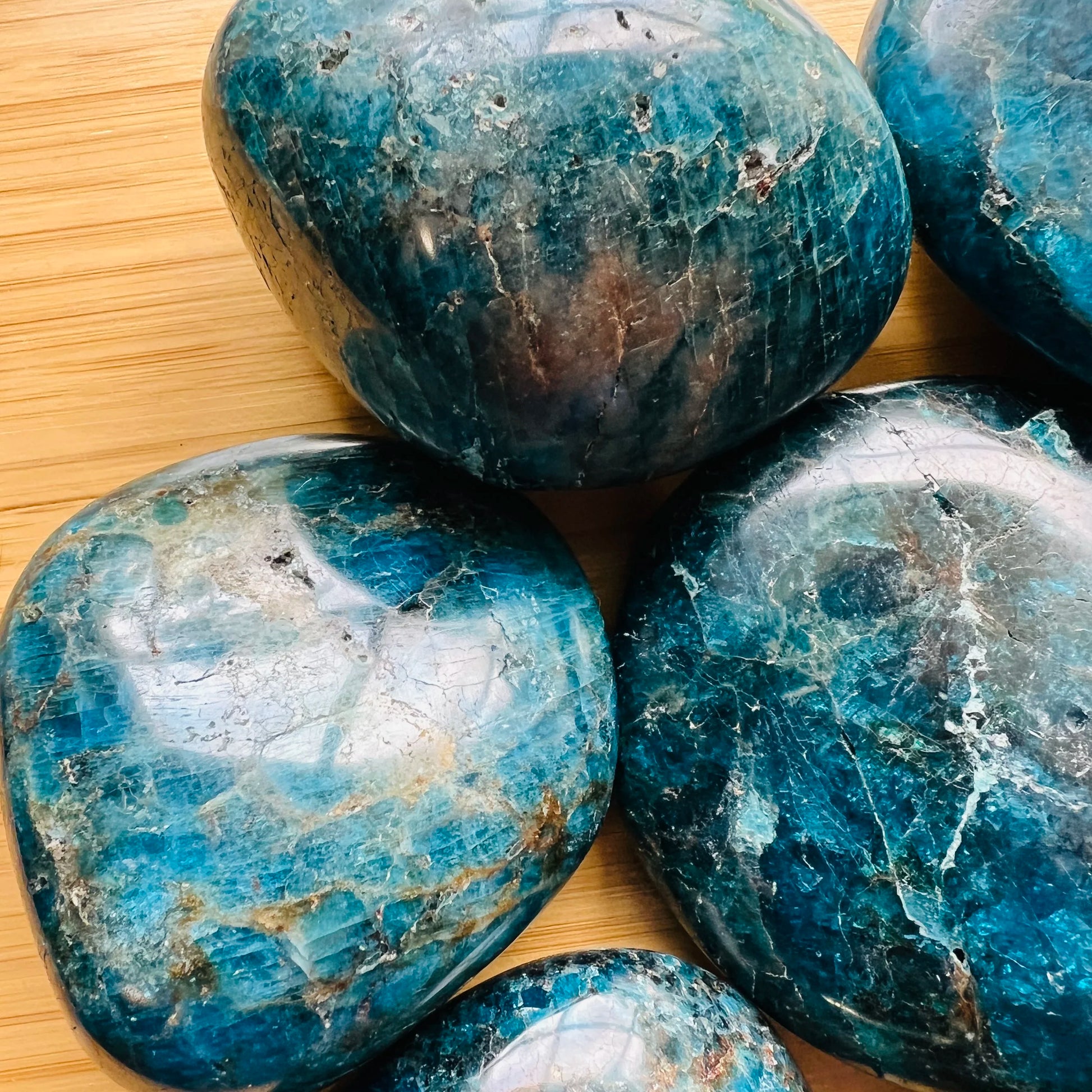 Overhead angle of Grade AA Apatite palm stone, carried for Focus, hand-selected from Anosy, Madagascar.