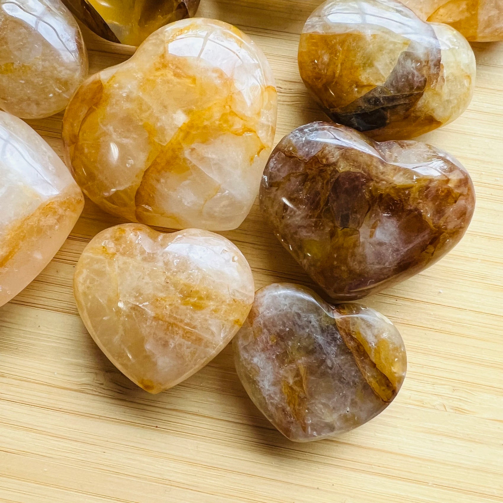 Looking down on Golden Healer polished heart, showing subtle veining, kept close for Healing.