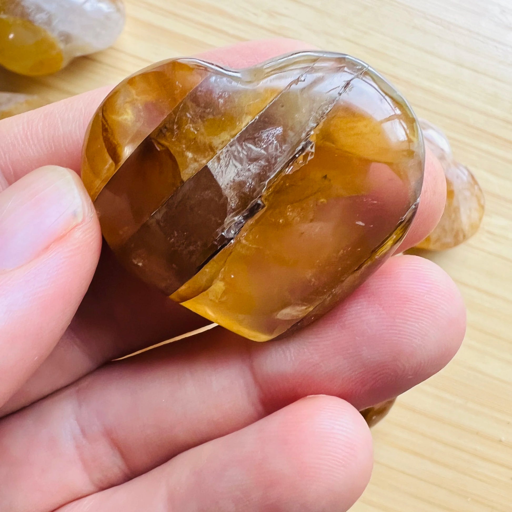 Back view of Grade AA Golden Healer heart showing natural surface