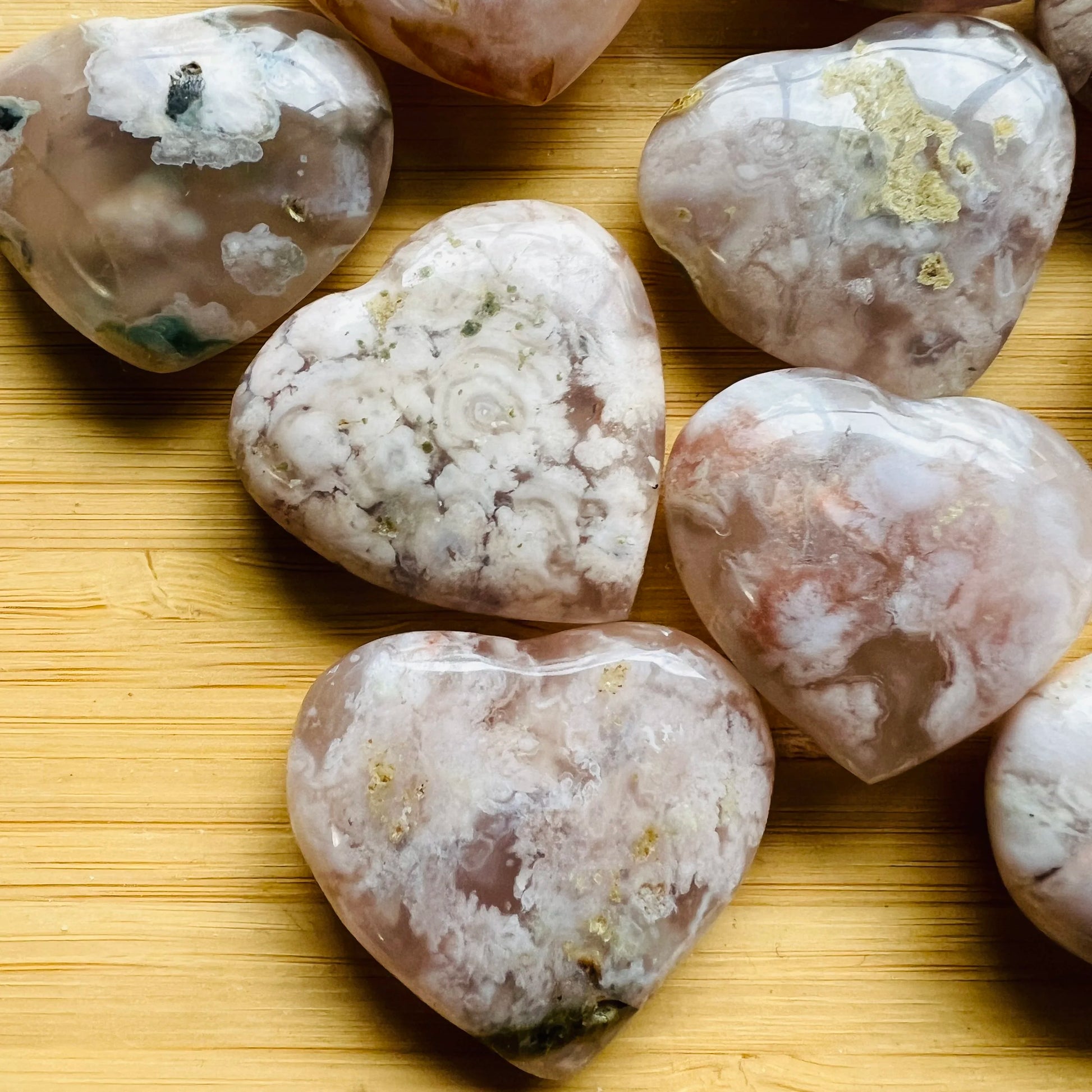 Looking down on Flower Agate polished heart, associated with Love.