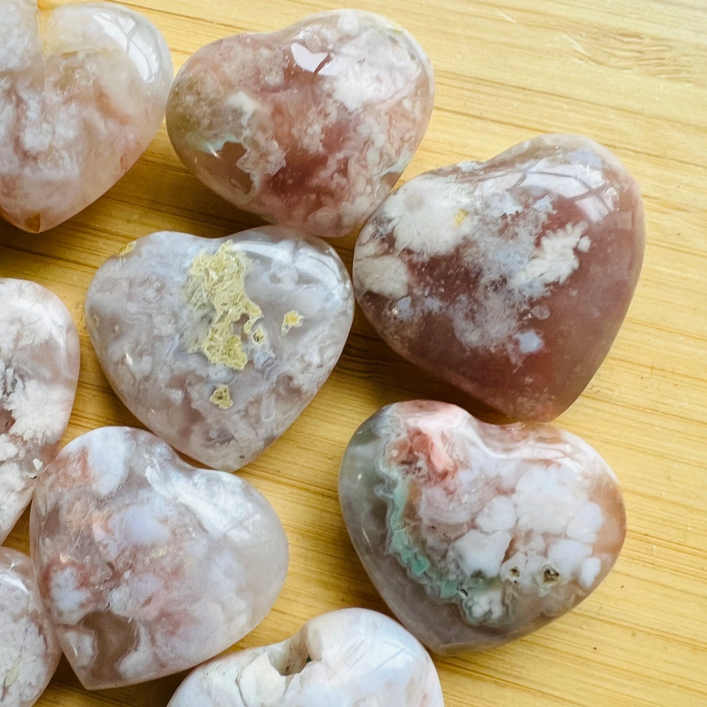 Reverse angle of Flower Agate polished heart, linked to Love and Emotional Healing, showing characteristic color.