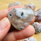 Detail shot of Grade AA Flower Agate heart under natural light