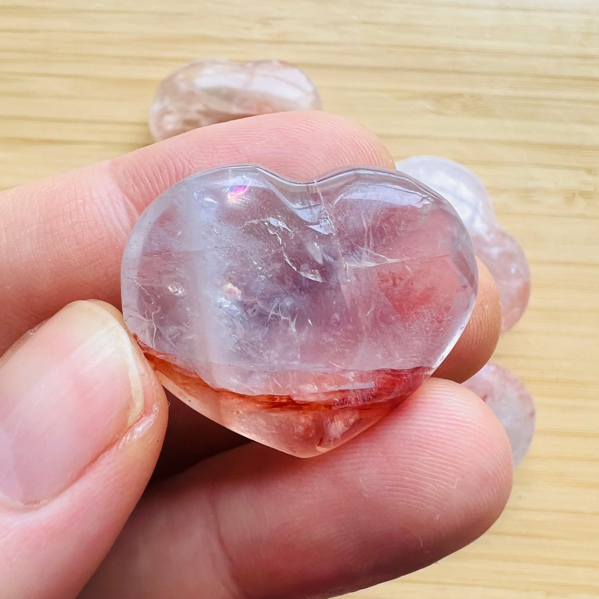 Back view of Grade AA Fire Quartz heart showing natural surface
