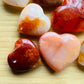 Alternate angle of Grade AA Carnelian heart showing overall shape