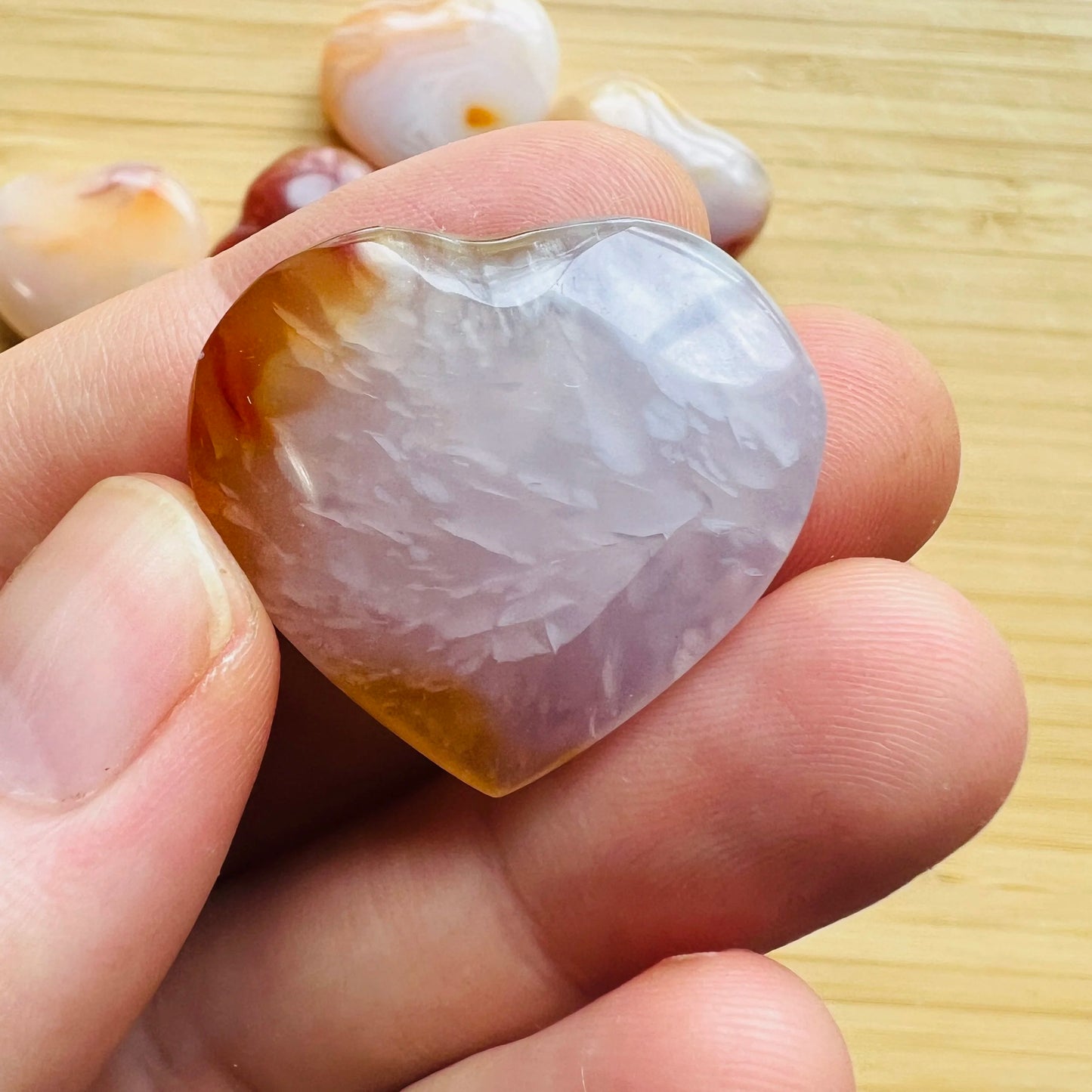 Back view of Grade AA Carnelian heart showing natural surface