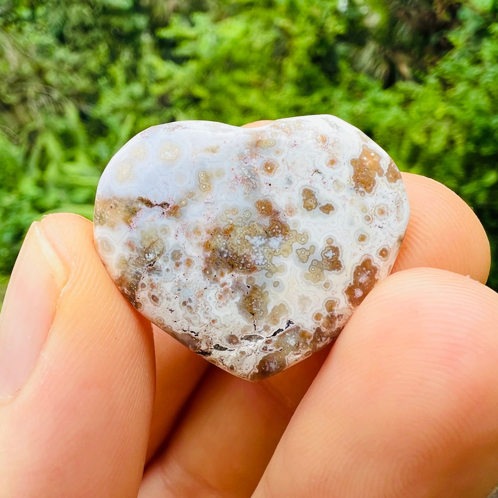 Side angle of Ocean Jasper polished heart, showing matte finish, associated with Emotional Healing and Stress Relief.