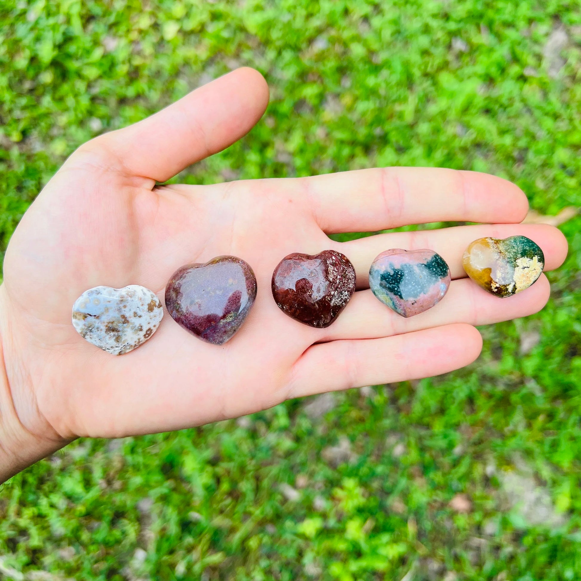 Close-up of Ocean Jasper heart carving from Madagascar, soothing wellness stone for Emotional Healing