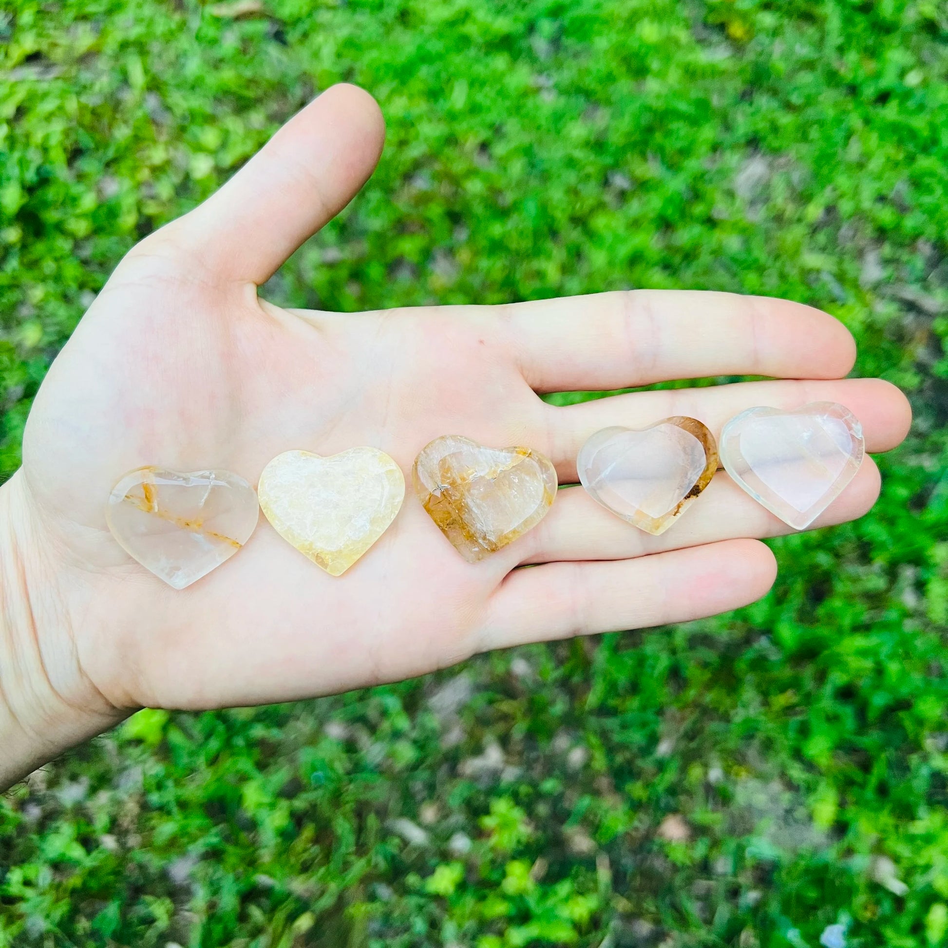 Close-up of Golden Healer polished heart, showing translucent edges, from Brazil.