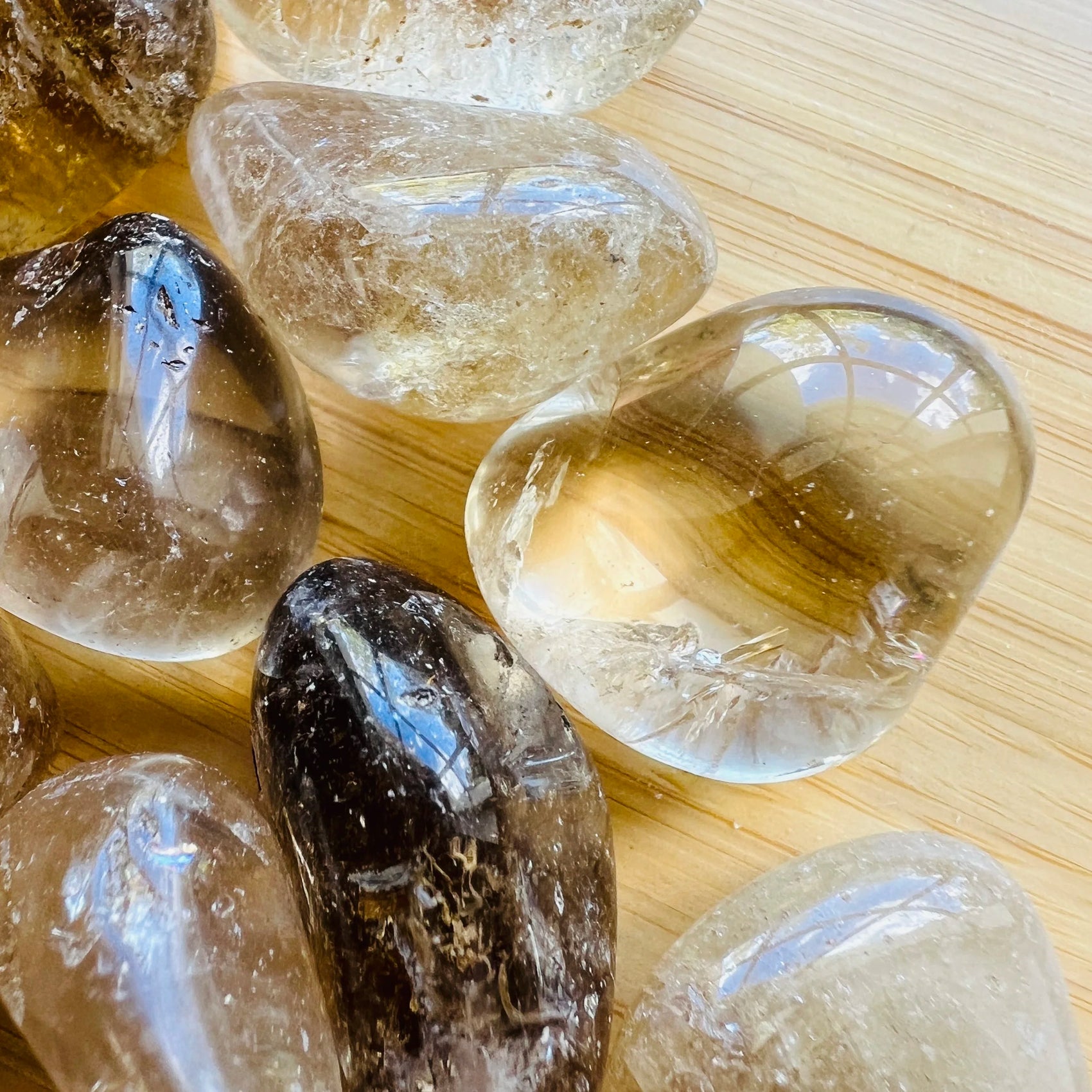 Aerial view of Natural Citrine tumbled stone, traditionally used for Abundance and Manifestation, showing characteristic finish.