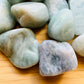 Bottom side of Aquamarine tumbled stone, hand-selected from Minas Gerais, Brazil.