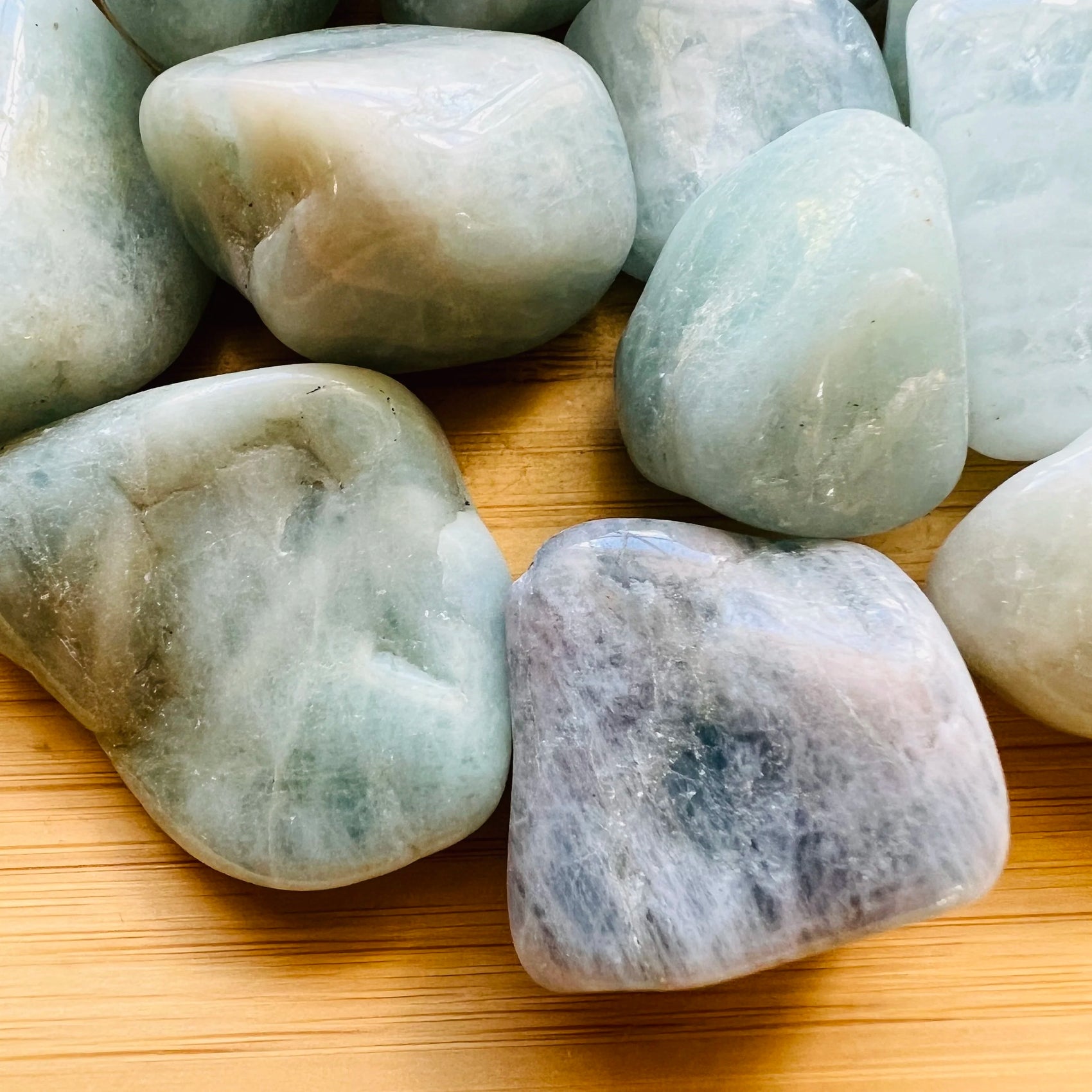 Bottom side of Aquamarine tumbled stone, hand-selected from Minas Gerais, Brazil.