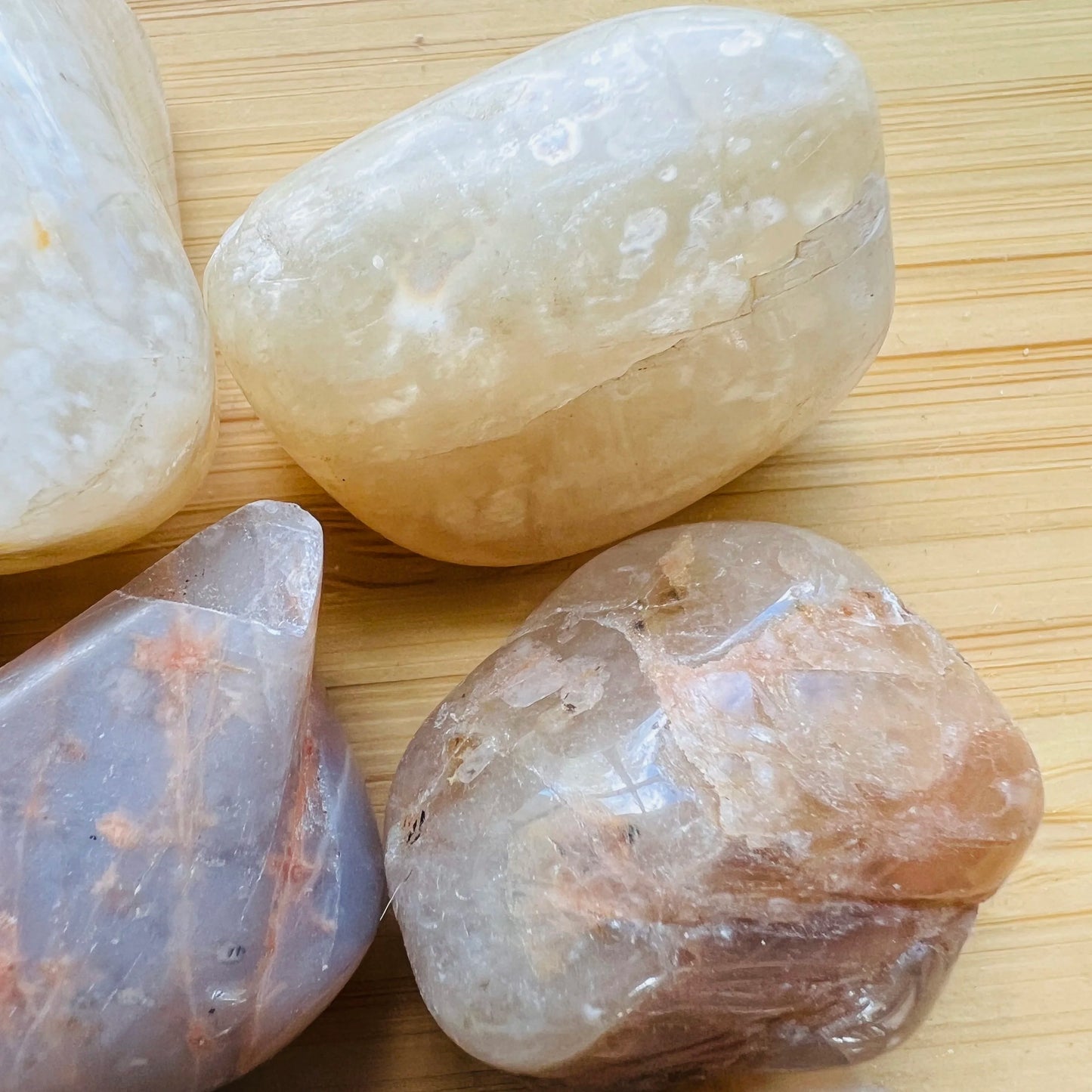 Bird's-eye view of brown Earth Moonstone tumbled stone, from Minas Gerais, Brazil, often kept for Grounding.