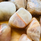 Bottom side of Earth Moonstone tumbled stone, from Minas Gerais, Brazil, often worked with for Grounding and Emotional Healing.
