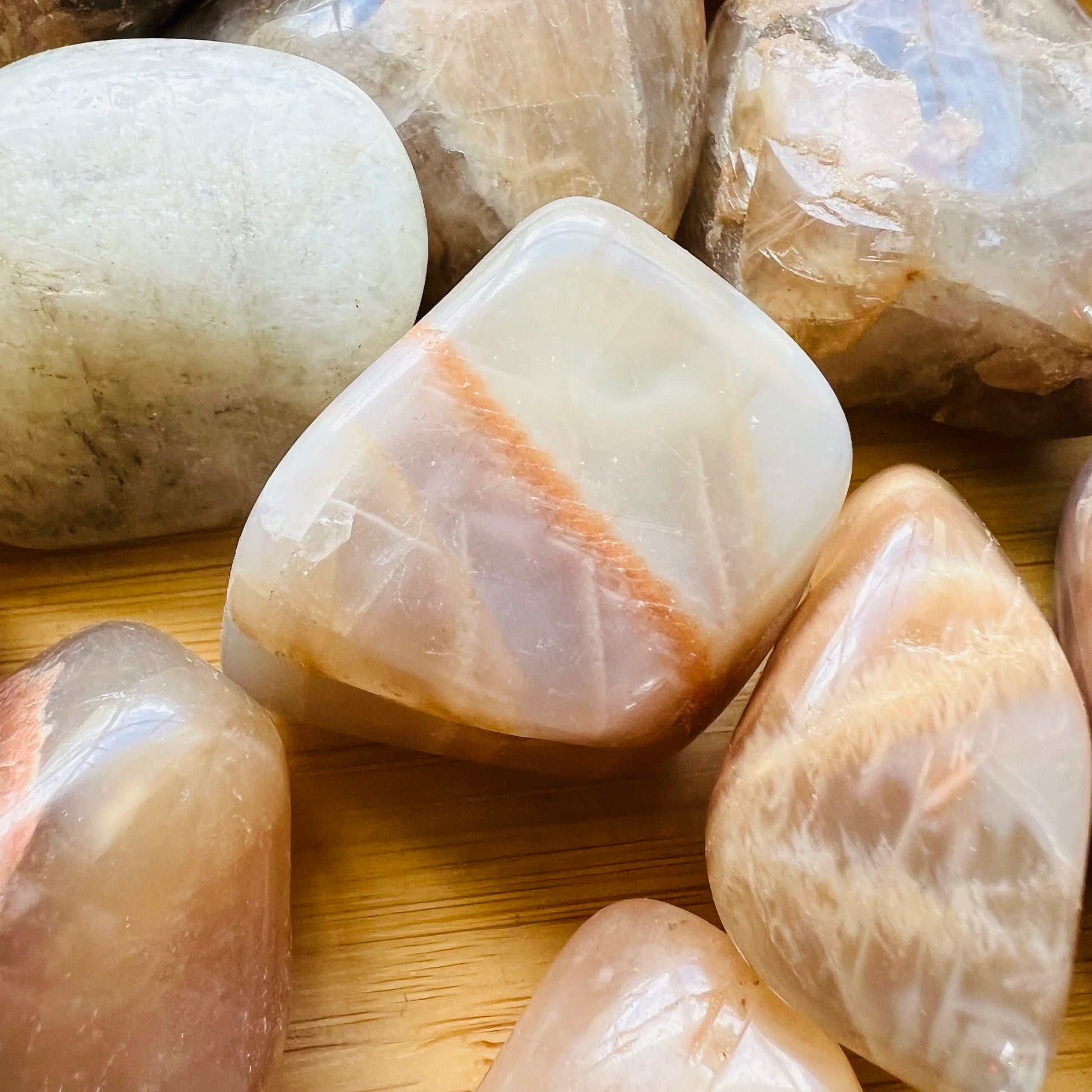 Bottom side of Earth Moonstone tumbled stone, from Minas Gerais, Brazil, often worked with for Grounding and Emotional Healing.