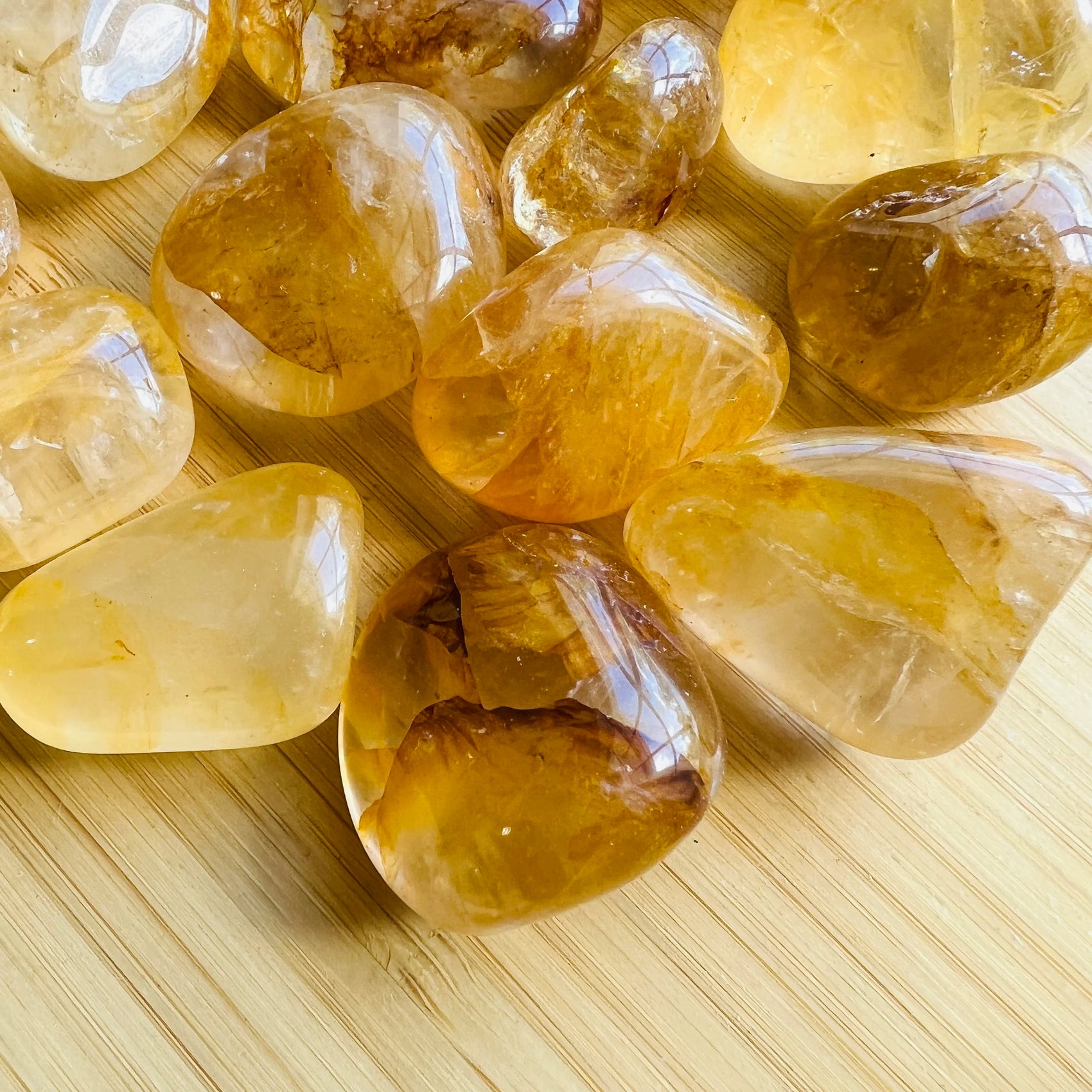 Natural surface of Grade AAA yellow Golden Healer tumbled stone, linked to Healing and Meditation, sourced from Brazil.