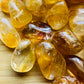 Full profile of Grade AAA Golden Healer tumbled stone ready to ship from Beyond Bohemian