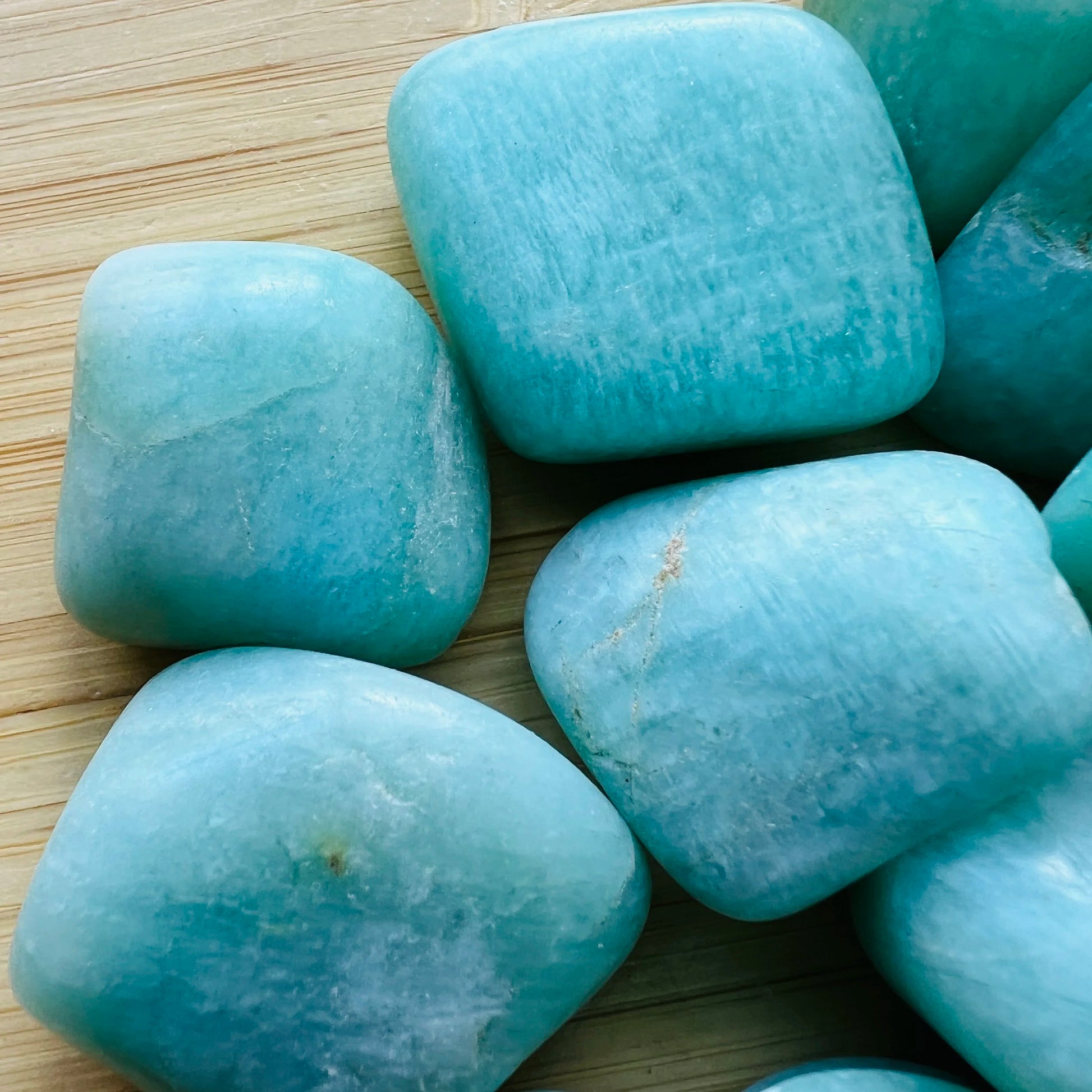 Color detail of Amazonite tumbled stone, Brazil-sourced.