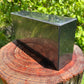 Edge-on view of Shungite polished block, from Republic of Karélia, Russia, showing natural variation.