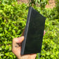 Detail shot of Grade Type III - Regular Grade Shungite slab under natural light