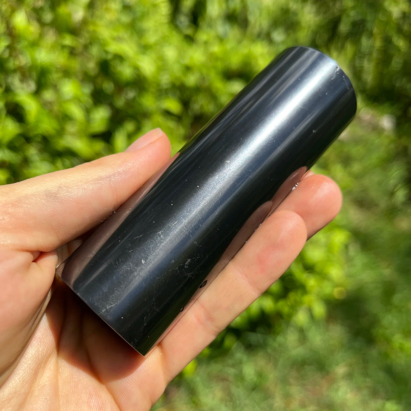 Plan view of Shungite polished cylinder, kept near for Protection, from Russia.