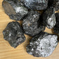 Close-up of Shungite raw stone from Russia, soothing wellness stone for Stress Relief