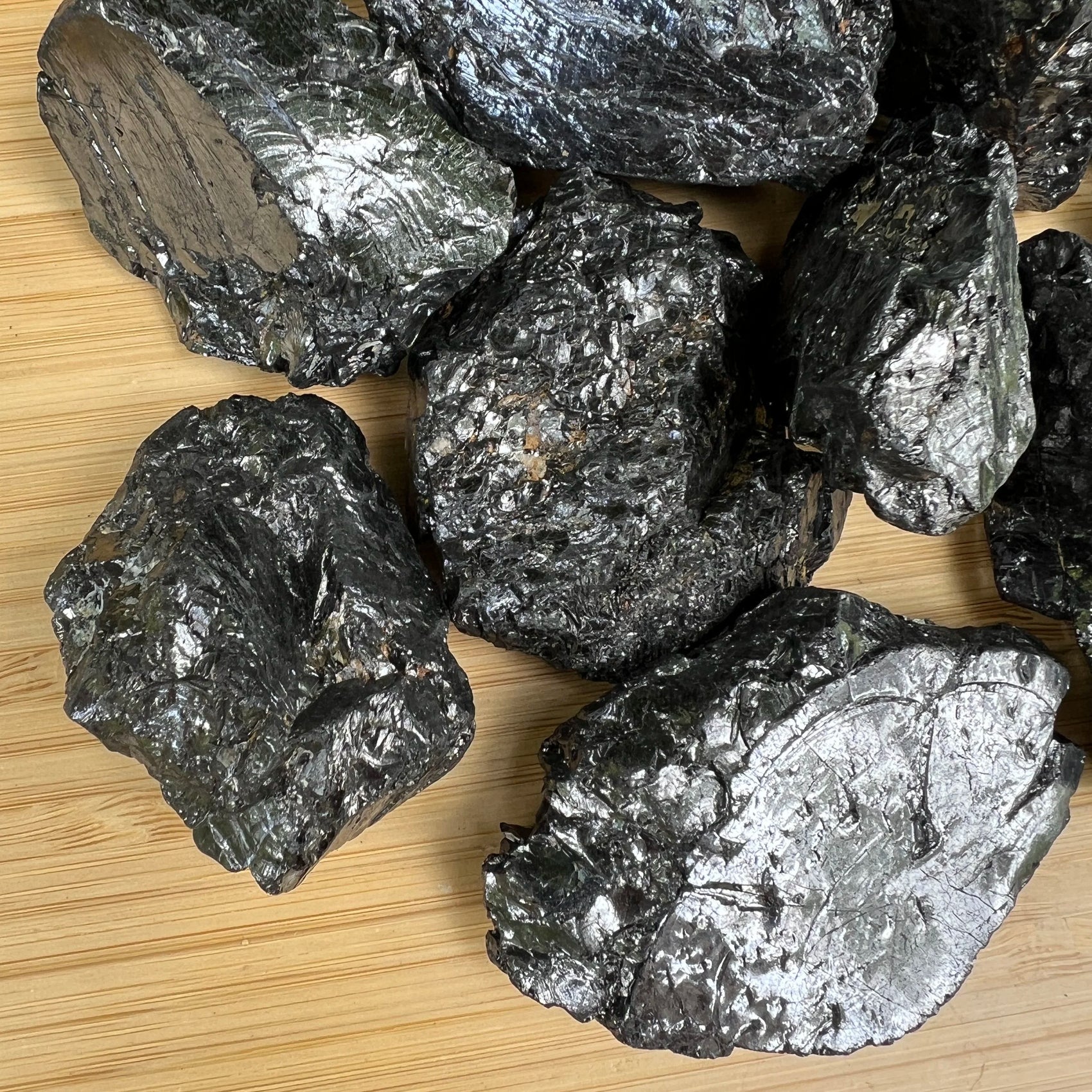 Surface detail of Shungite raw stone, showing characteristic patterning, Russia-sourced.