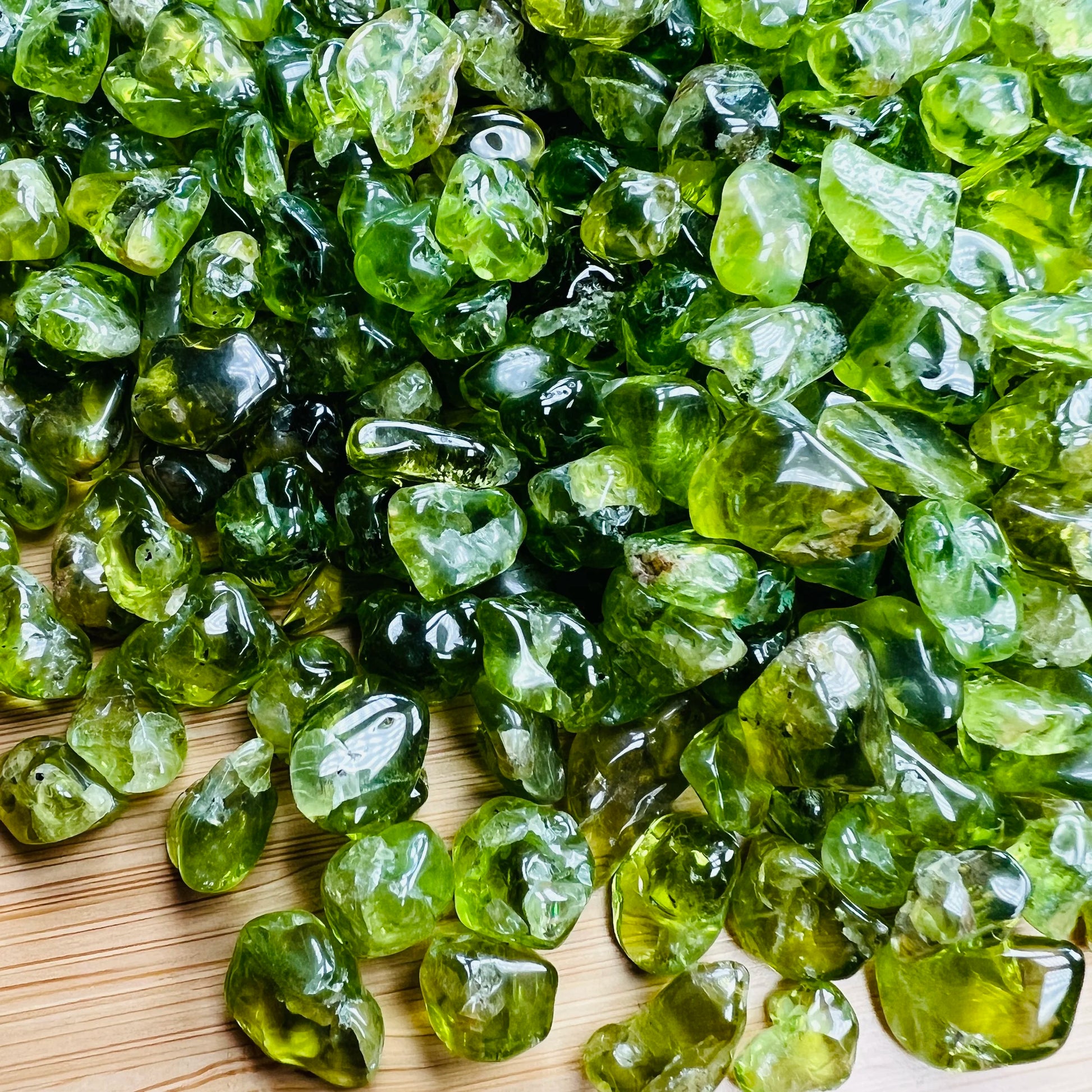 Detail of Peridot tumbled stone, showing subtle veining.