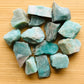 Close-up of Grade A blue Amazonite raw stone, often paired with practices around Stress Relief, showing characteristic finish.