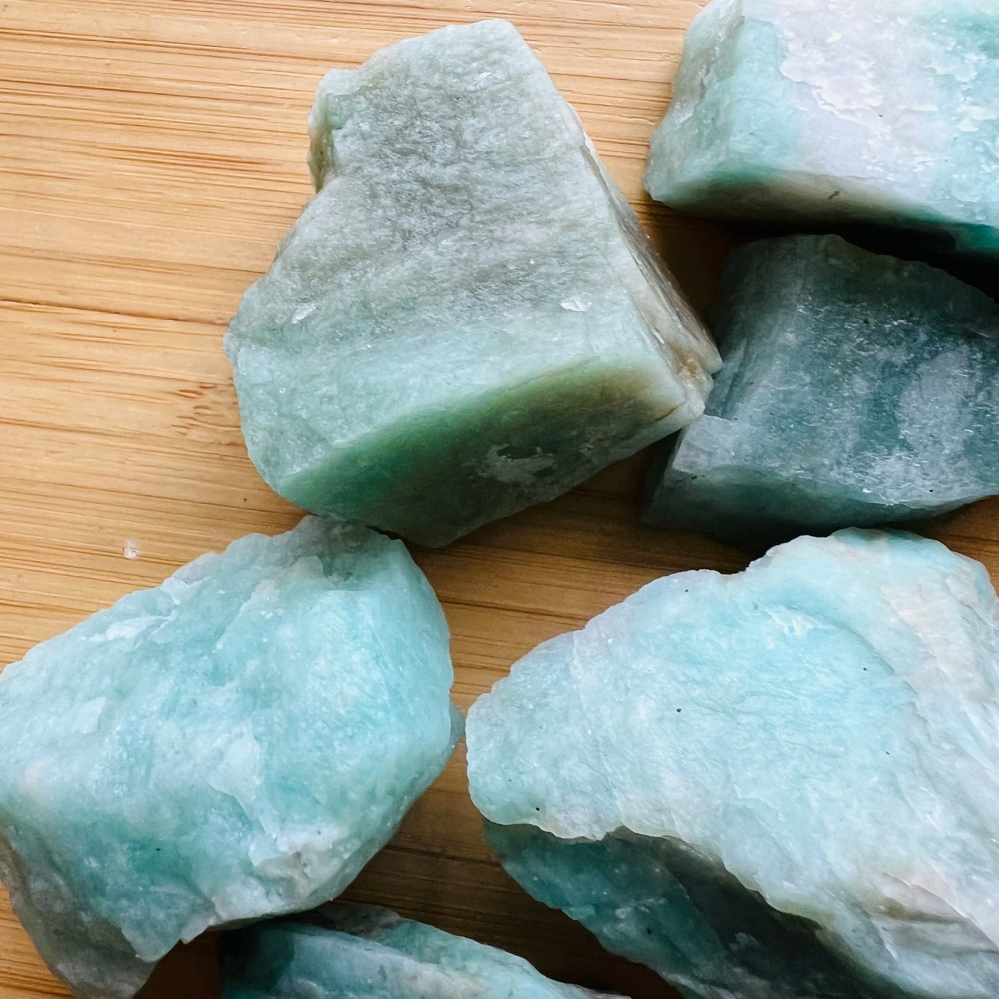 Rear view of Amazonite raw stone, showing tight grain, kept close for Stress Relief and Emotional Healing.