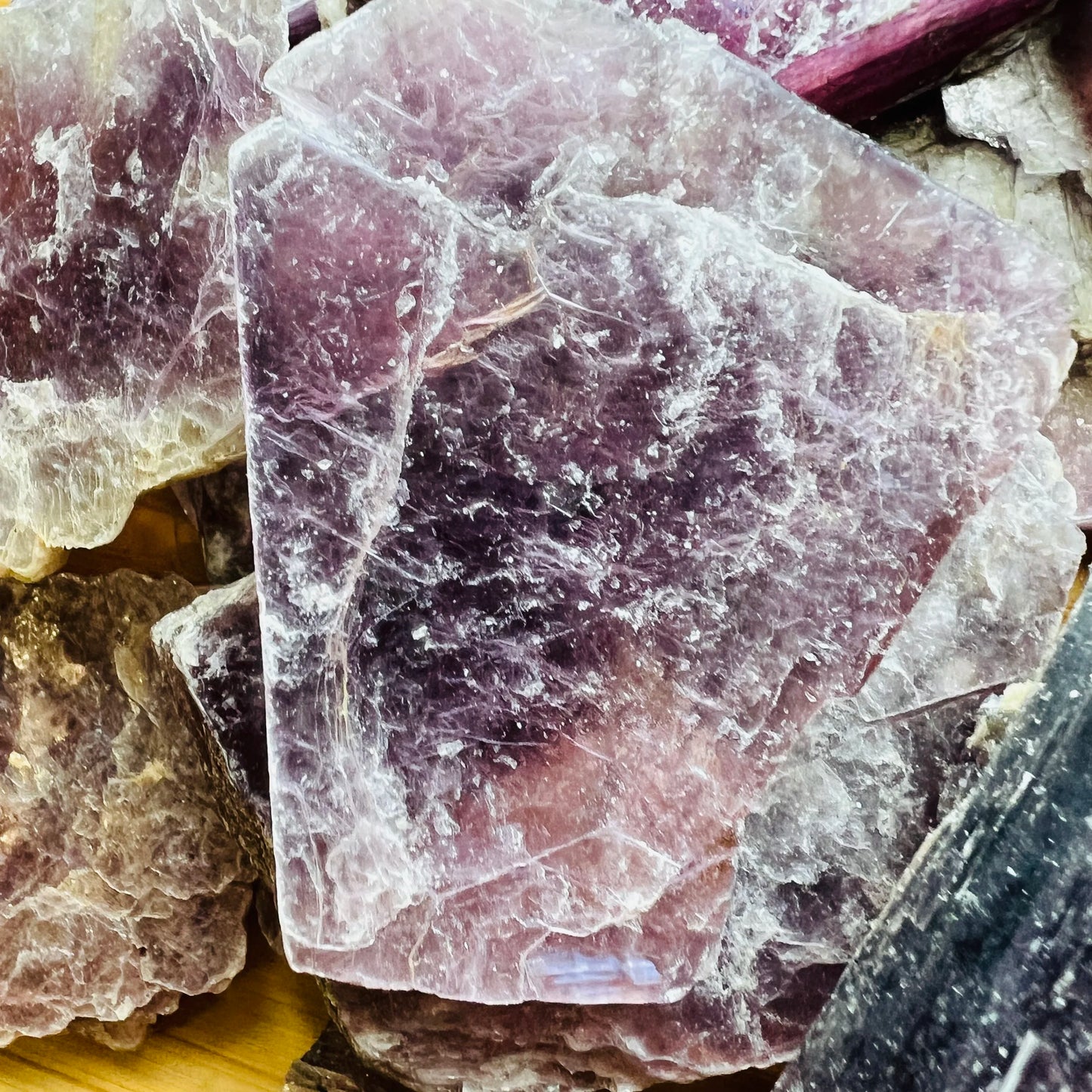 Top view of Lepidolite raw stone, showing open form, sourced from Brazil.