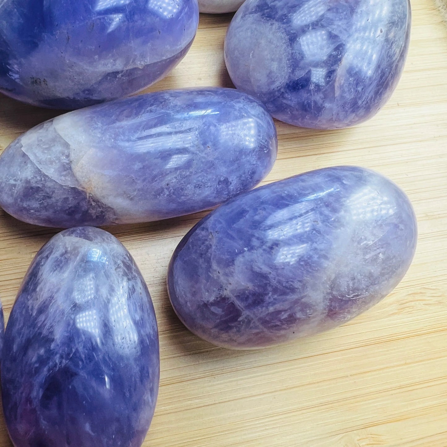 Natural surface of Banded Amethyst palm stone, showing color depth, from Madagascar.