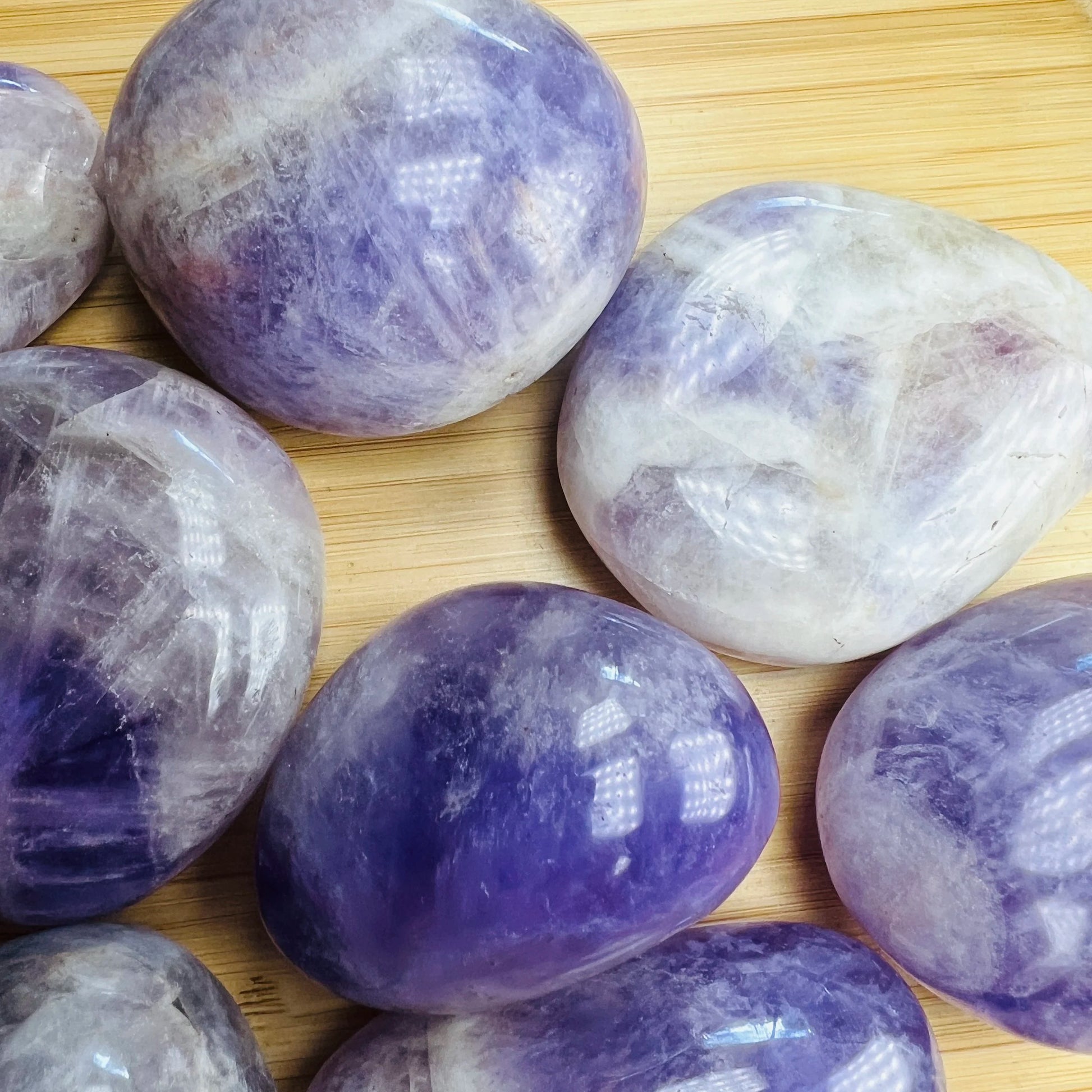 Overhead view of Banded Amethyst palm stone, showing translucent edges.