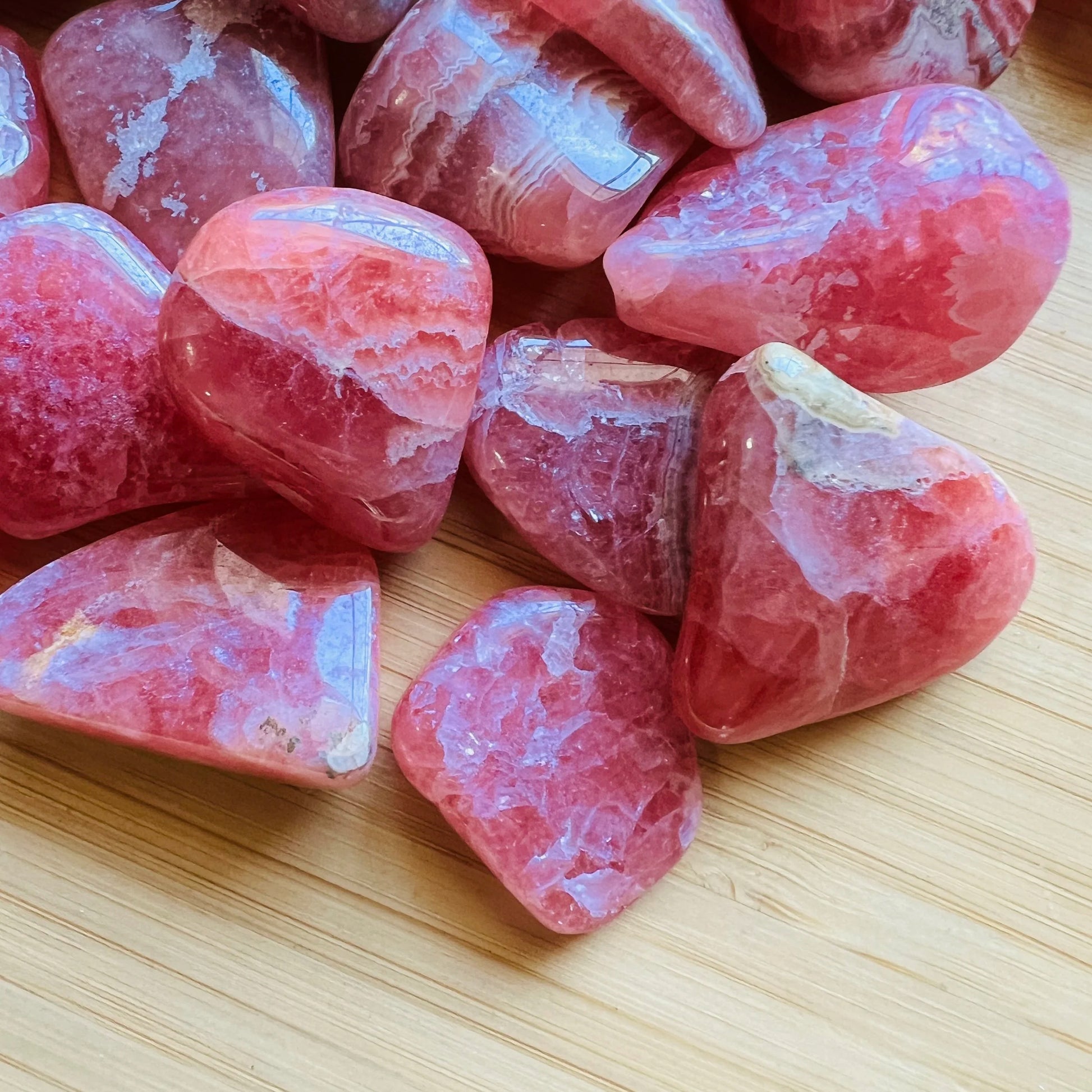 Full profile of Grade AA Rhodochrosite tumbled stone ready to ship from Beyond Bohemian