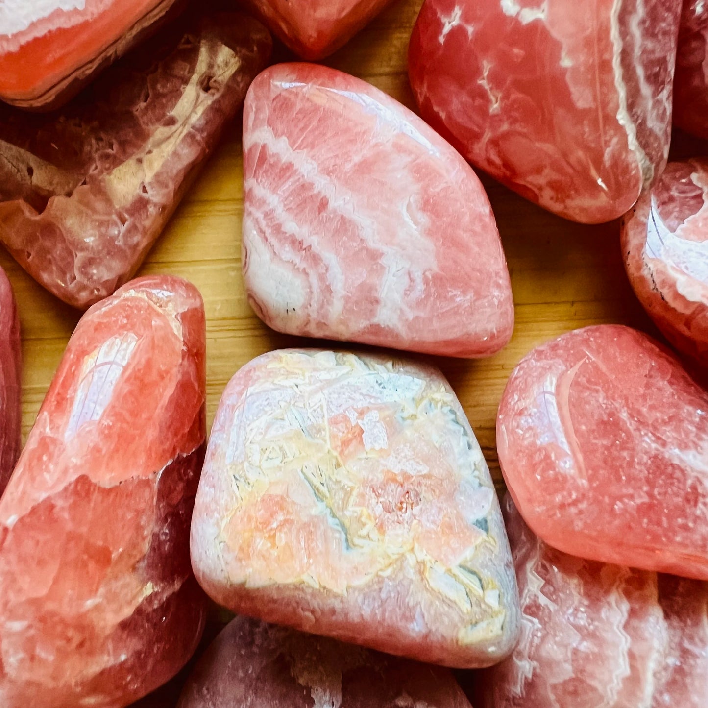 Size comparison with a Rhodochrosite tumbled stone, Argentina-sourced.