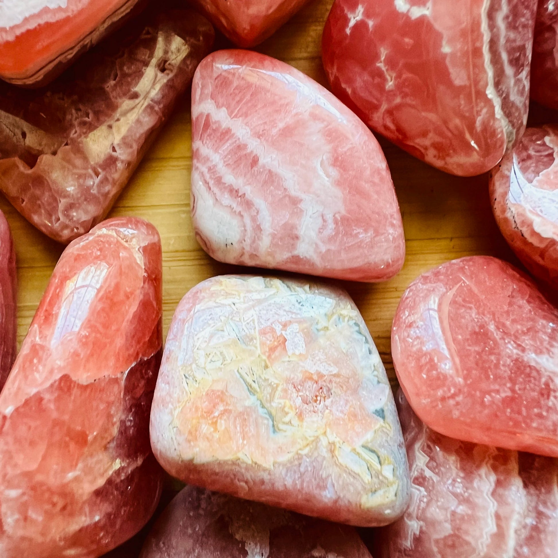 Size comparison with a Rhodochrosite tumbled stone, Argentina-sourced.