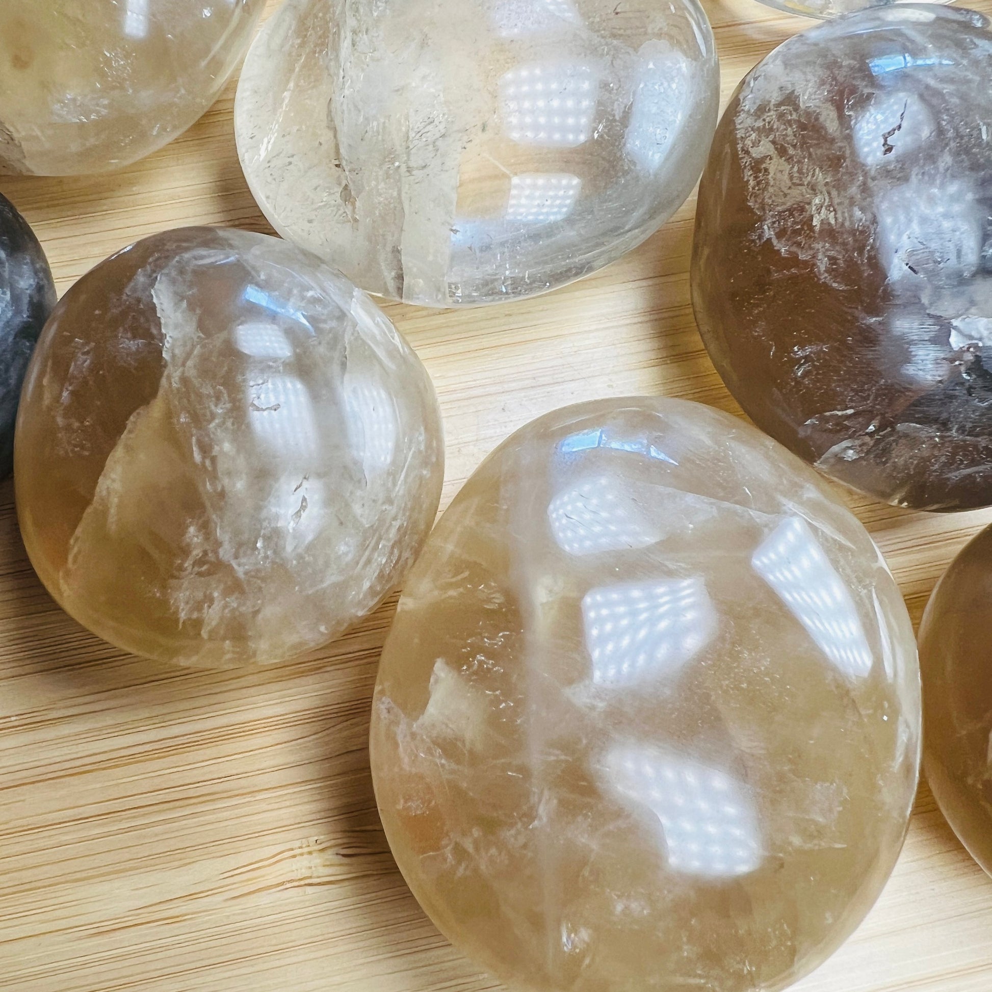 Detail of Natural Citrine palm stone, kept near for Abundance, sourced from Vakinankaratra, Madagascar.