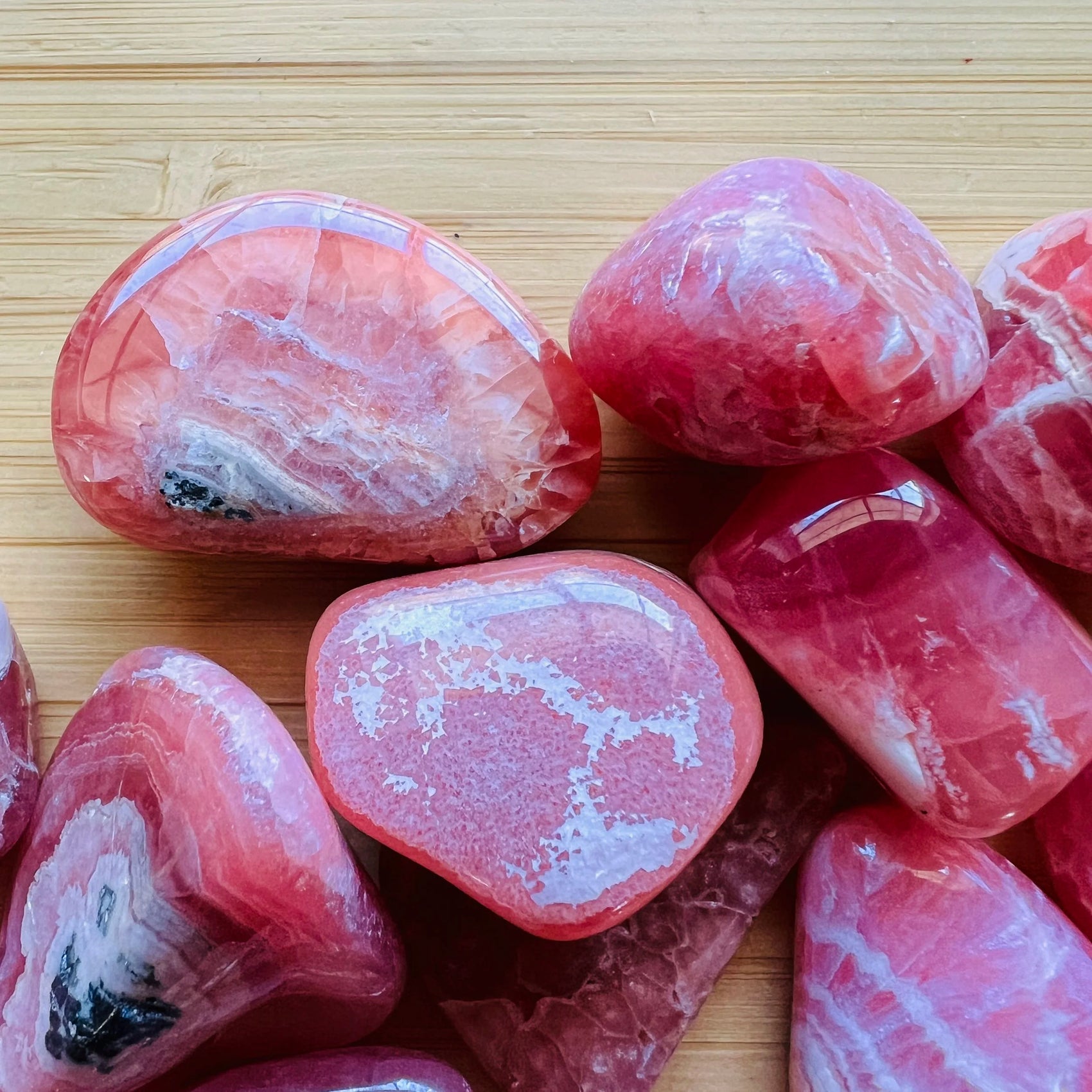 Full profile of Grade AA Rhodochrosite tumbled stone ready to ship from Beyond Bohemian