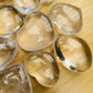 Back view of Grade AA Clear Quartz heart showing natural surface