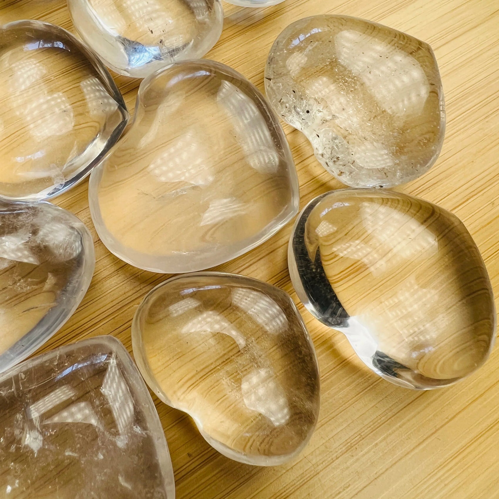 Back view of Grade AA Clear Quartz heart showing natural surface