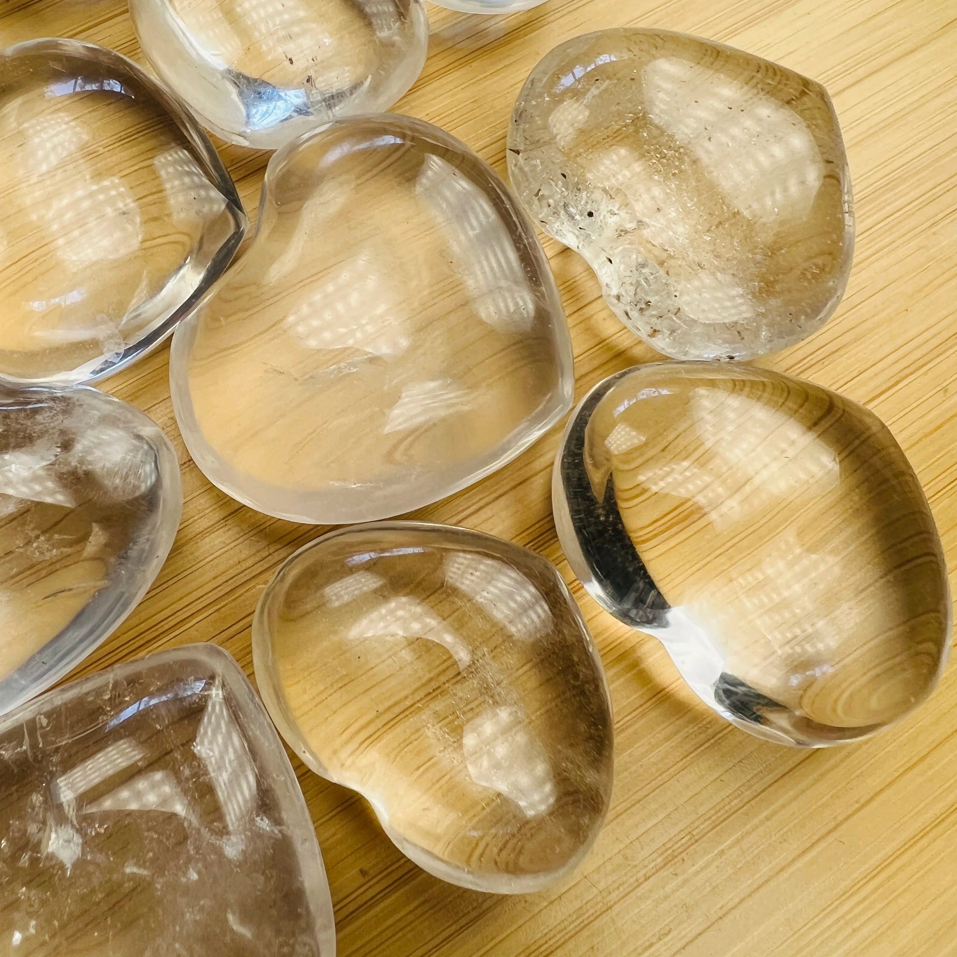 Back view of Grade AA Clear Quartz heart showing natural surface