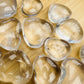 Detail shot of Grade AA Clear Quartz heart under natural light