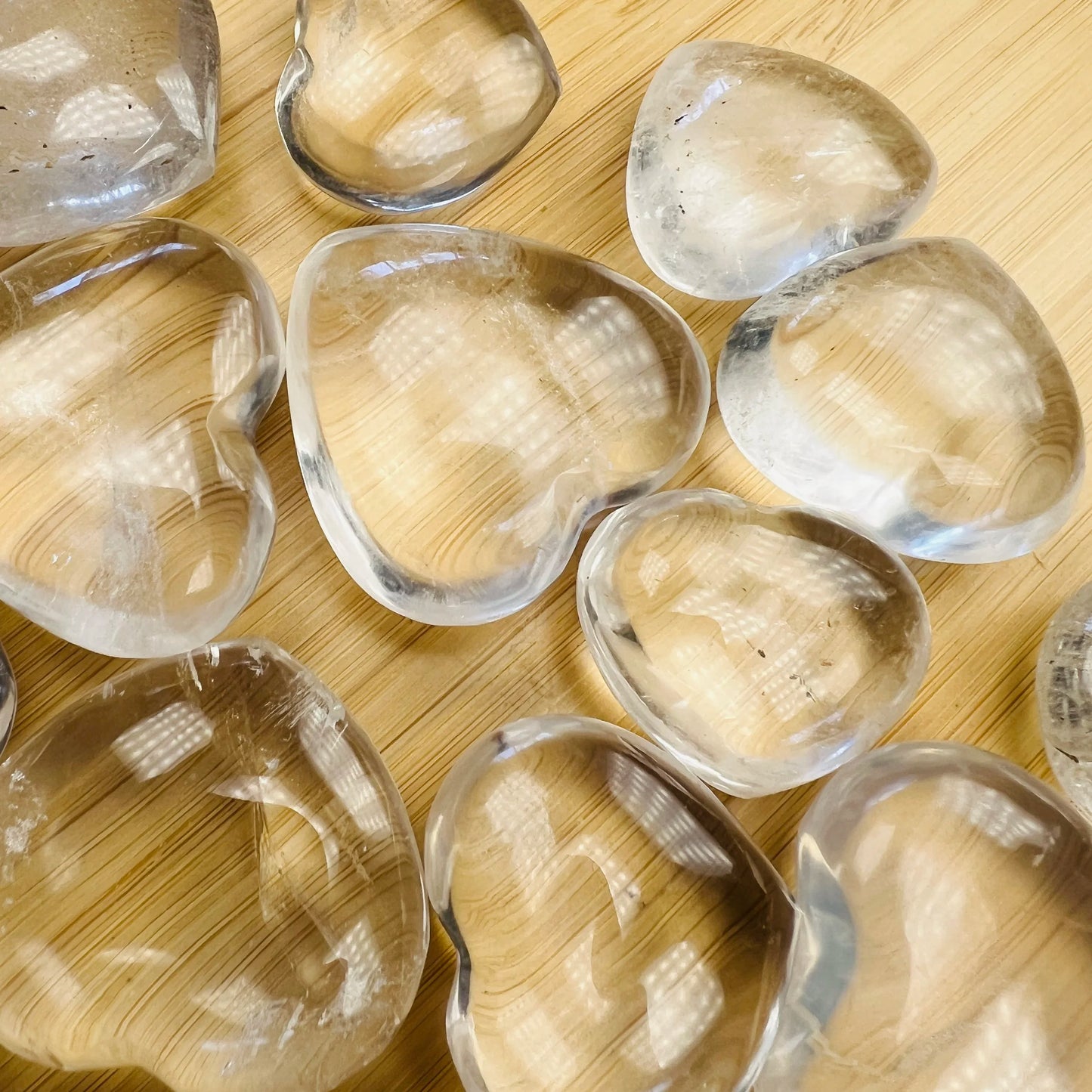Detail shot of Grade AA Clear Quartz heart under natural light