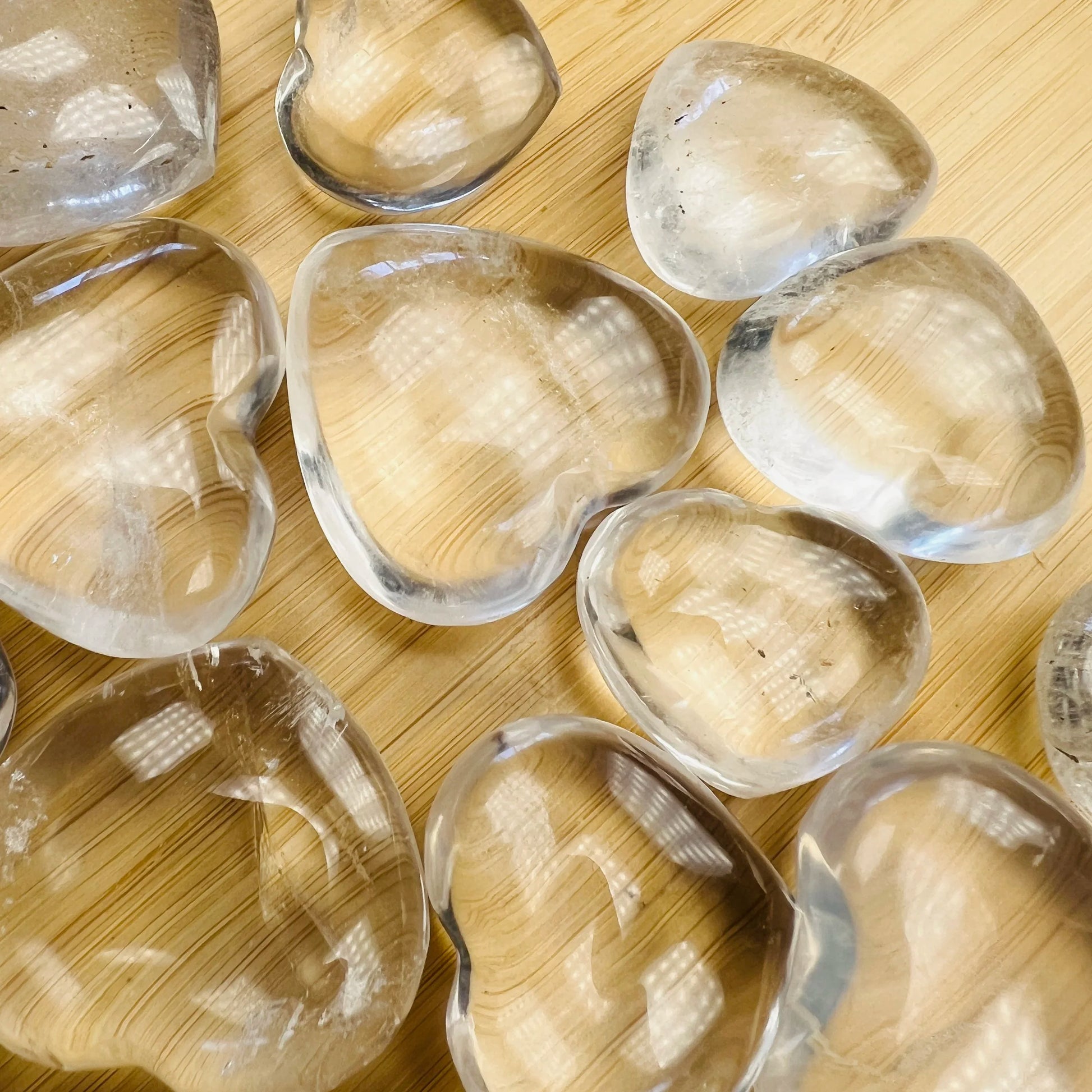 Detail shot of Grade AA Clear Quartz heart under natural light