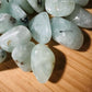 Close detail of Prehnite tumbled stone, sourced from Erongo, Namibia.