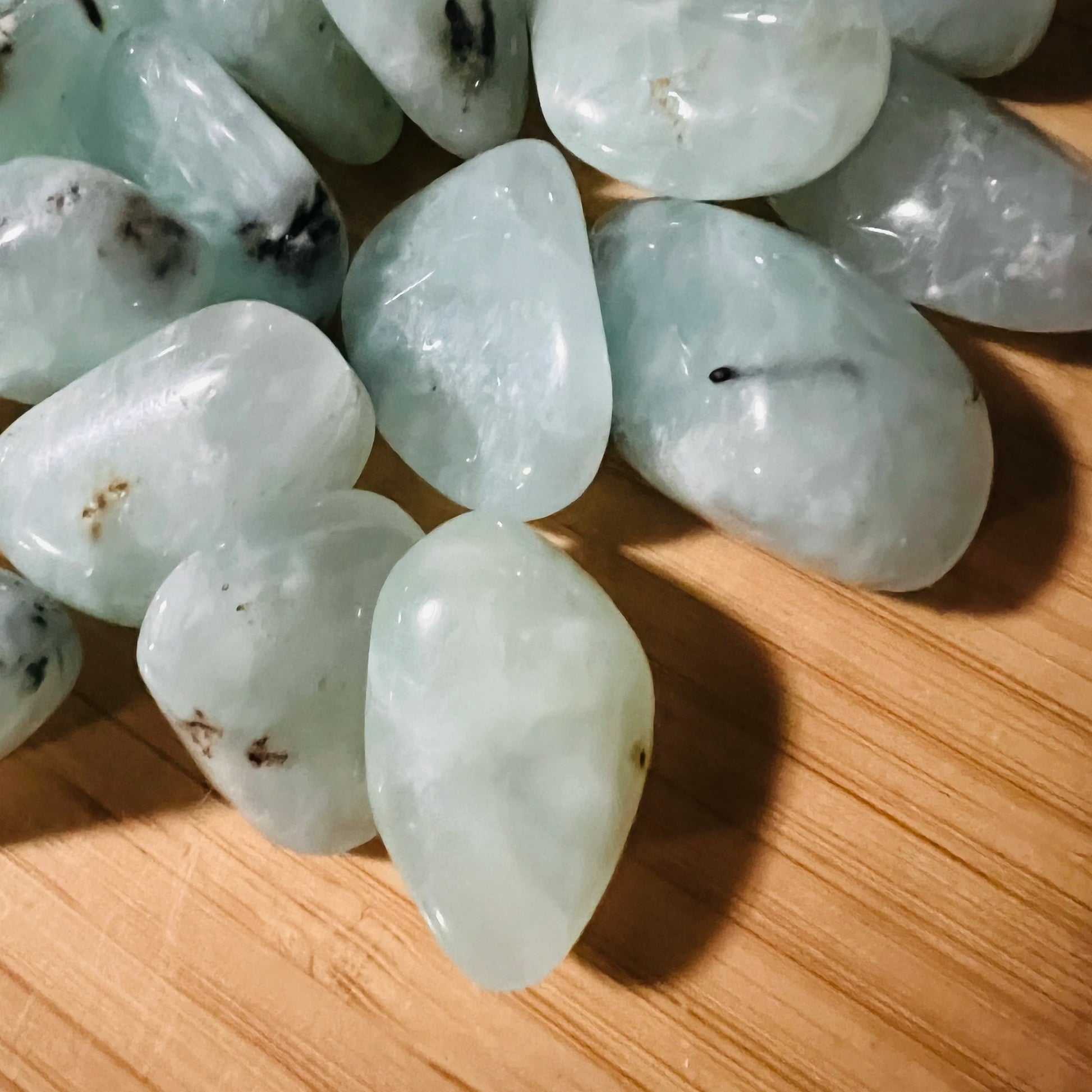 Close detail of Prehnite tumbled stone, sourced from Erongo, Namibia.