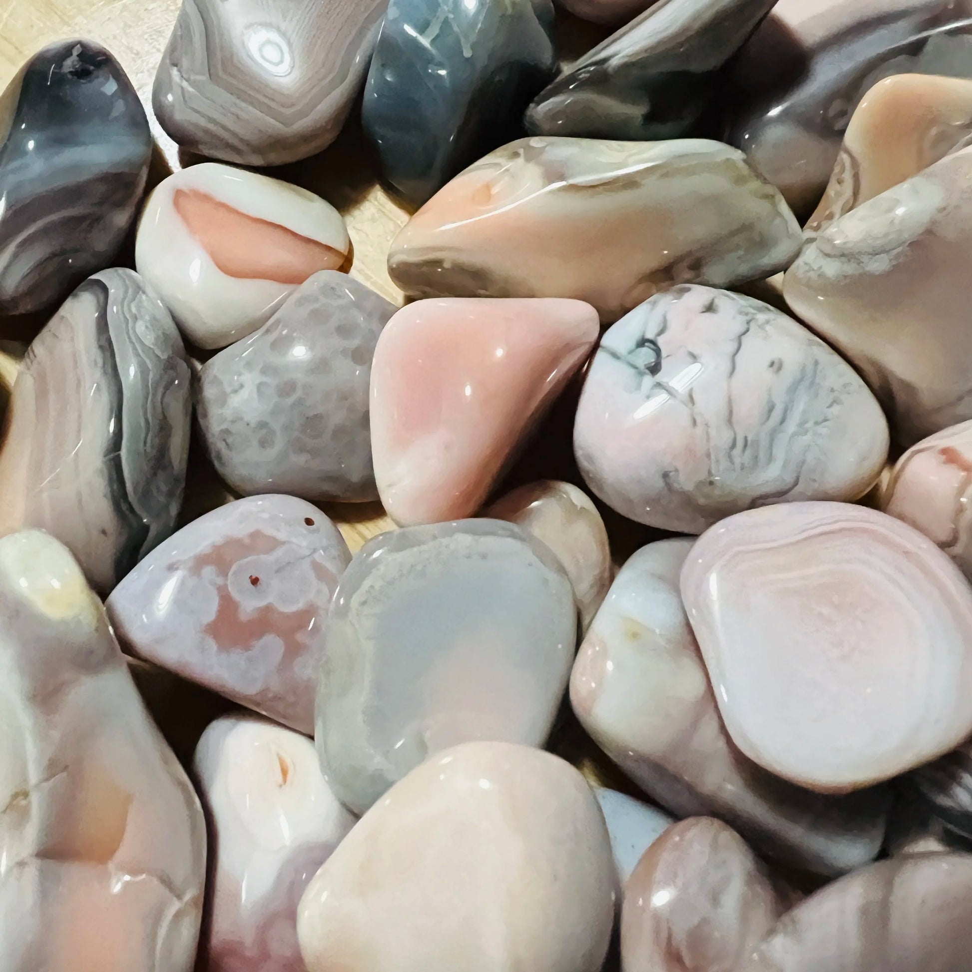 Plan view of Pink Agate tumbled stone, showing natural variation.