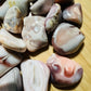 Underside detail of Pink Agate tumbled stone, from Botswana, carried for Love and Self Love.