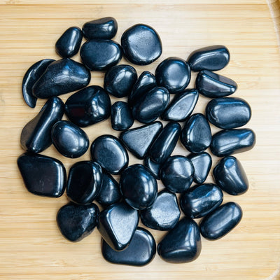 Shungite tumbled stone in Black tones, ethically sourced from Russia for Stress Relief and Cleansing