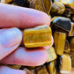 Full profile of Grade A Tiger Eye tumbled stone ready to ship from Beyond Bohemian