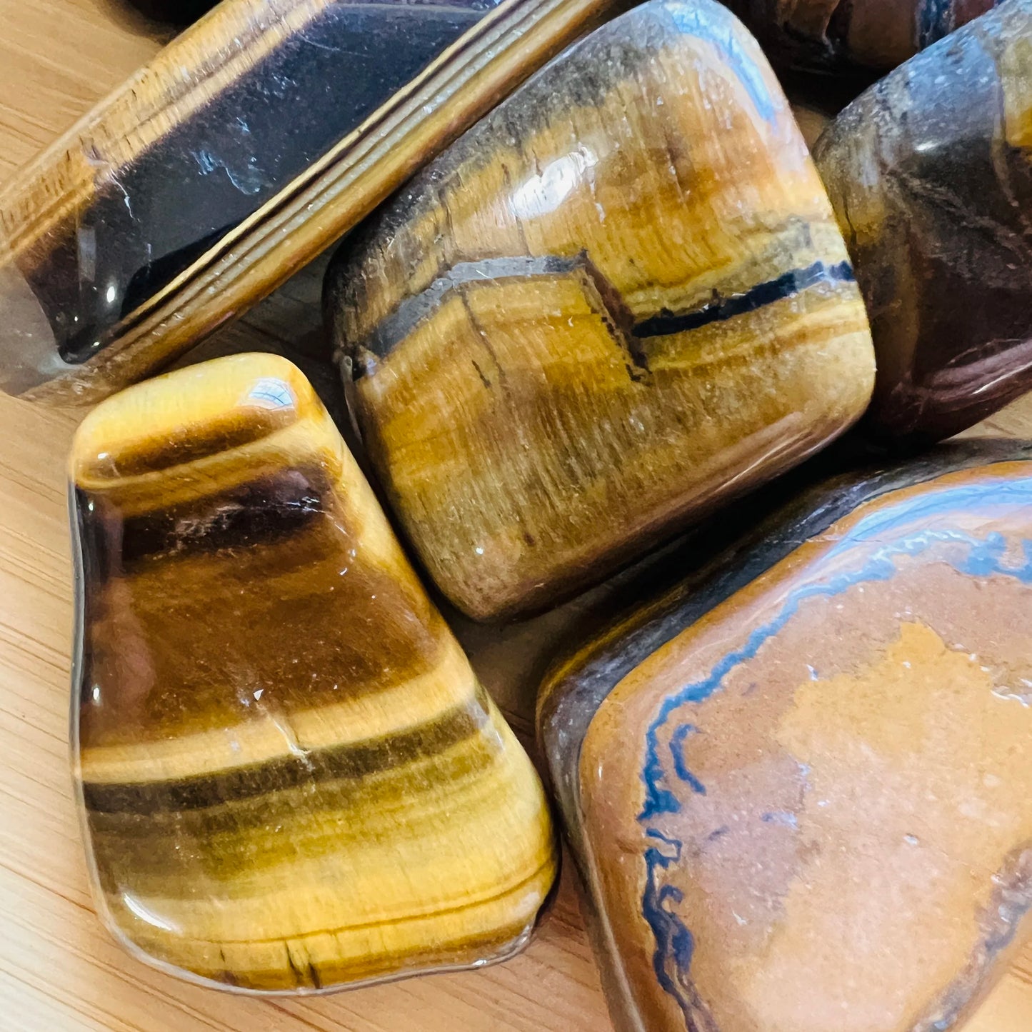 Full profile of Grade A Tiger Eye tumbled stone ready to ship from Beyond Bohemian